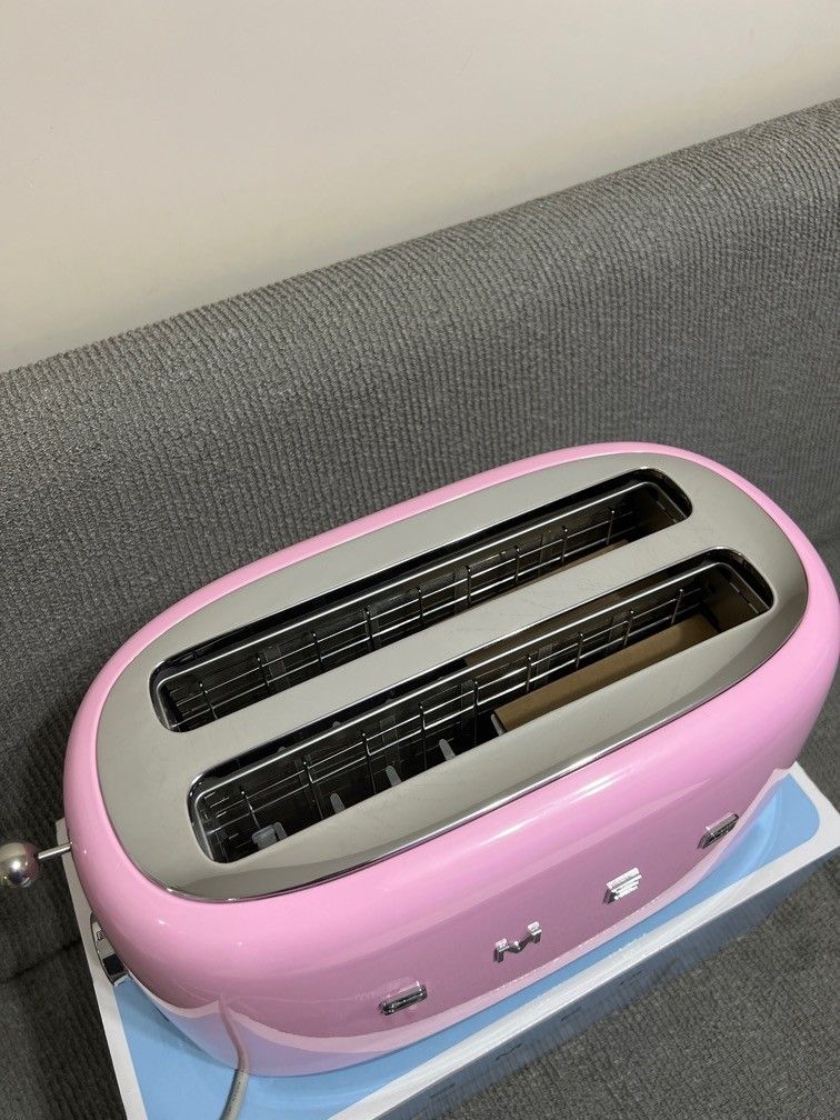 https://media.karousell.com/media/photos/products/2023/8/20/smeg_50s_toaster_4_slices_tsf0_1692545268_5b3c51f1_progressive.jpg