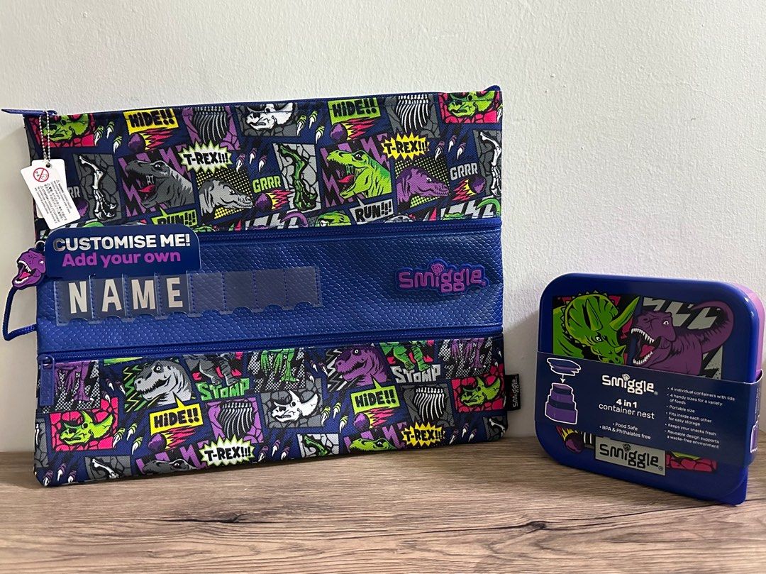 Smiggle envelope bag and 4-in-1 container set dinosaur (FIXED PRICE) (Category: Stationery & School Supplies) located in Paranaque City. Submitted by sellingstuff22 (Listing ID 1249990382, Image 1). Description: 100% authentic Smiggle Australia bought Set for 1820 php If individually sold: Nesting container (4 in 1) 850php Envelope 1050php.