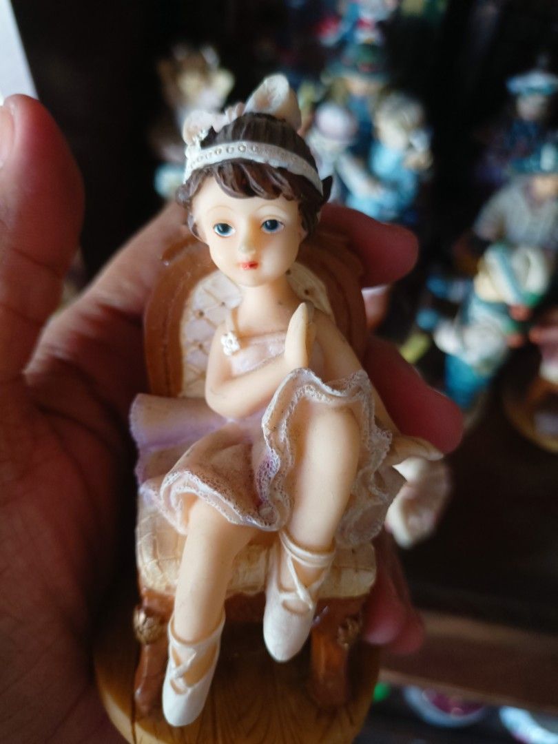 Regency fine arts porcelain dolls top