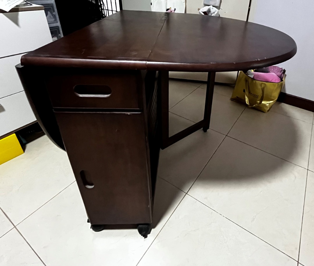 Wooden foldable dining table (with wheels) with 4 chairs in good