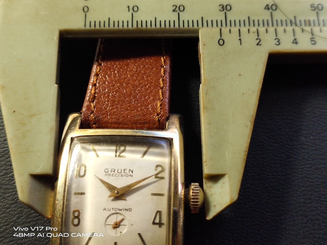 Gold discount gruen watch