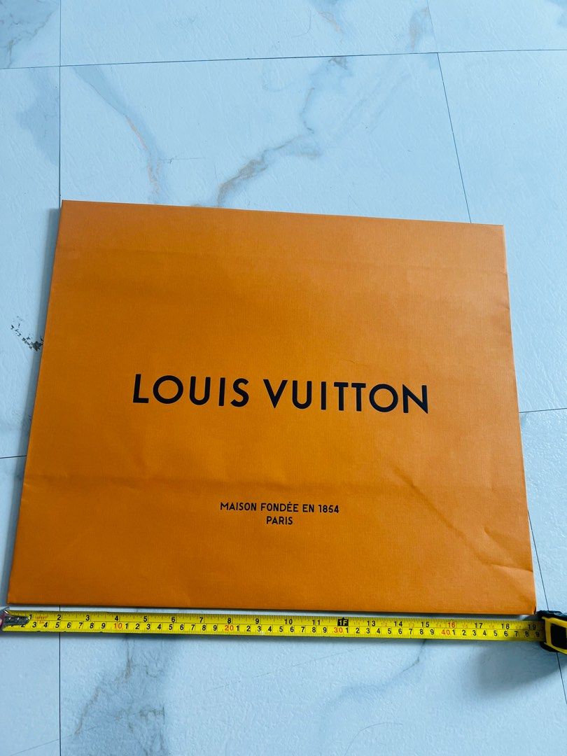 Authentic/ Original Extra Large/ Large LV Louis Vuitton paperbag (Category: Luxury Bags & Wallets) located in Quezon City. Submitted by nxdeclutters (Listing ID 1250206343, Image 2). Description: Decluttering 19”x 16”x9” 49x41x23 cm Extra paperbags available 5-6 pcs left Please do not inquire if unsure, let’s respect each other’s time :) All are bought from Italy and guaranteed authentic 5 paperbags with minimal signs of storage, 1 used paperbag 