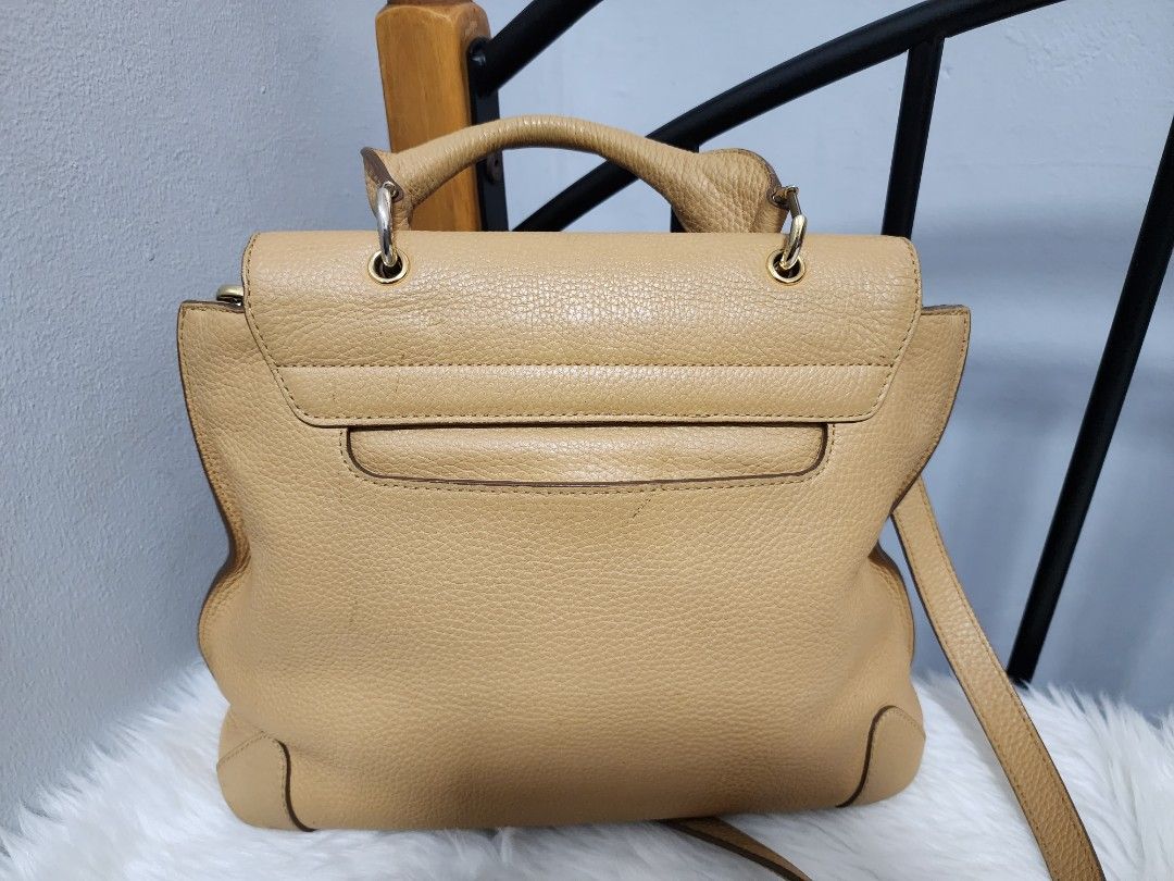 Authentic MCM Two way leather bag (Category: Luxury Bags & Wallets) located in Paranaque City. Submitted by rizasauthenticitems (Listing ID 1250218158, Image 3). Description: Authentic mcm 2 way satchel Excellent condition. Clean in and out with detchable long sling for cross body. With twist lock and mcm logo infront.