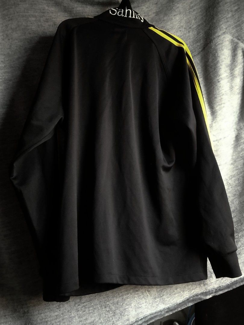 Black jacket with yellow stripes store