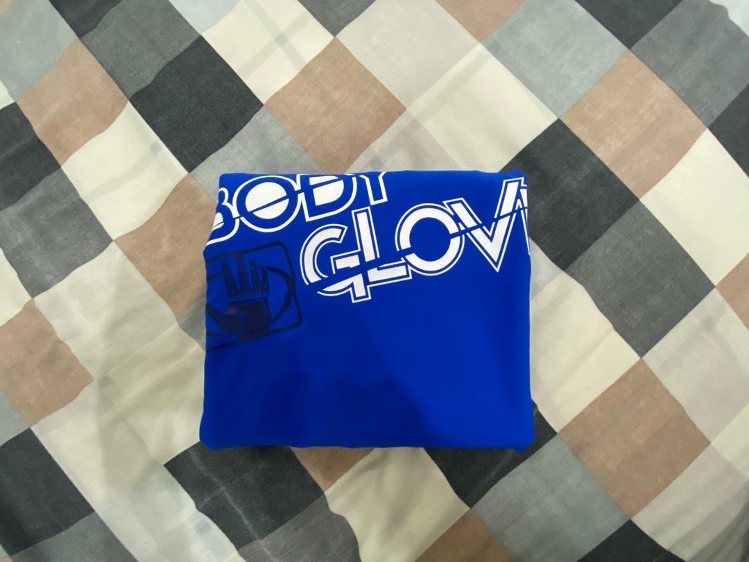 Body Glove Rashguard (Category: Activewear) located in Las Pinas. Submitted by elektraaaa (Listing ID 1250275628, Image 2). Description: ▫️Can fit both older kids’ and petite ladies ▫️Perfect for sun protection both in and out of the water ▫️Higher chlorine resistance than standard swimwear fabrics ▫️High color performance - enabling the use of fluo and bright colors for water visibility.