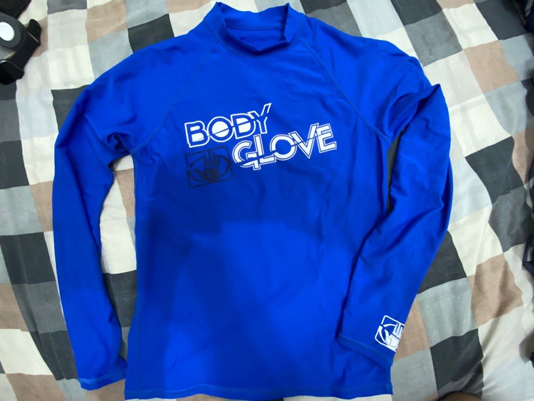 Body Glove Rashguard (Category: Activewear) located in Las Pinas. Submitted by elektraaaa (Listing ID 1250275628, Image 1). Description: ▫️Can fit both older kids’ and petite ladies ▫️Perfect for sun protection both in and out of the water ▫️Higher chlorine resistance than standard swimwear fabrics ▫️High color performance - enabling the use of fluo and bright colors for water visibility.