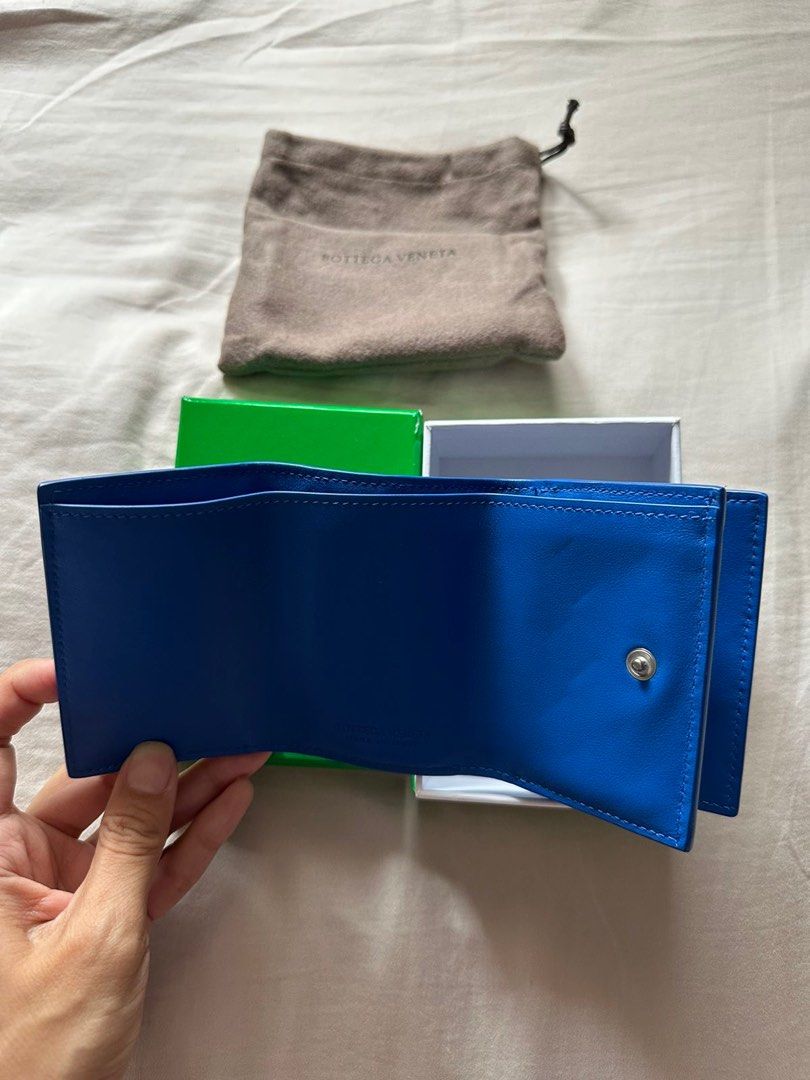 Bottega Venetta tri-fold wallet (Category: Luxury Bags & Wallets) located in Pasay City. Submitted by netuy (Listing ID 1250305990, Image 2). Description: Intercciato leather wallet. Color parakeet (royal blue). Tri-fold - bill compartment, 3 card slots, with coin purse. Bought in Italy last June 2023 only. .
