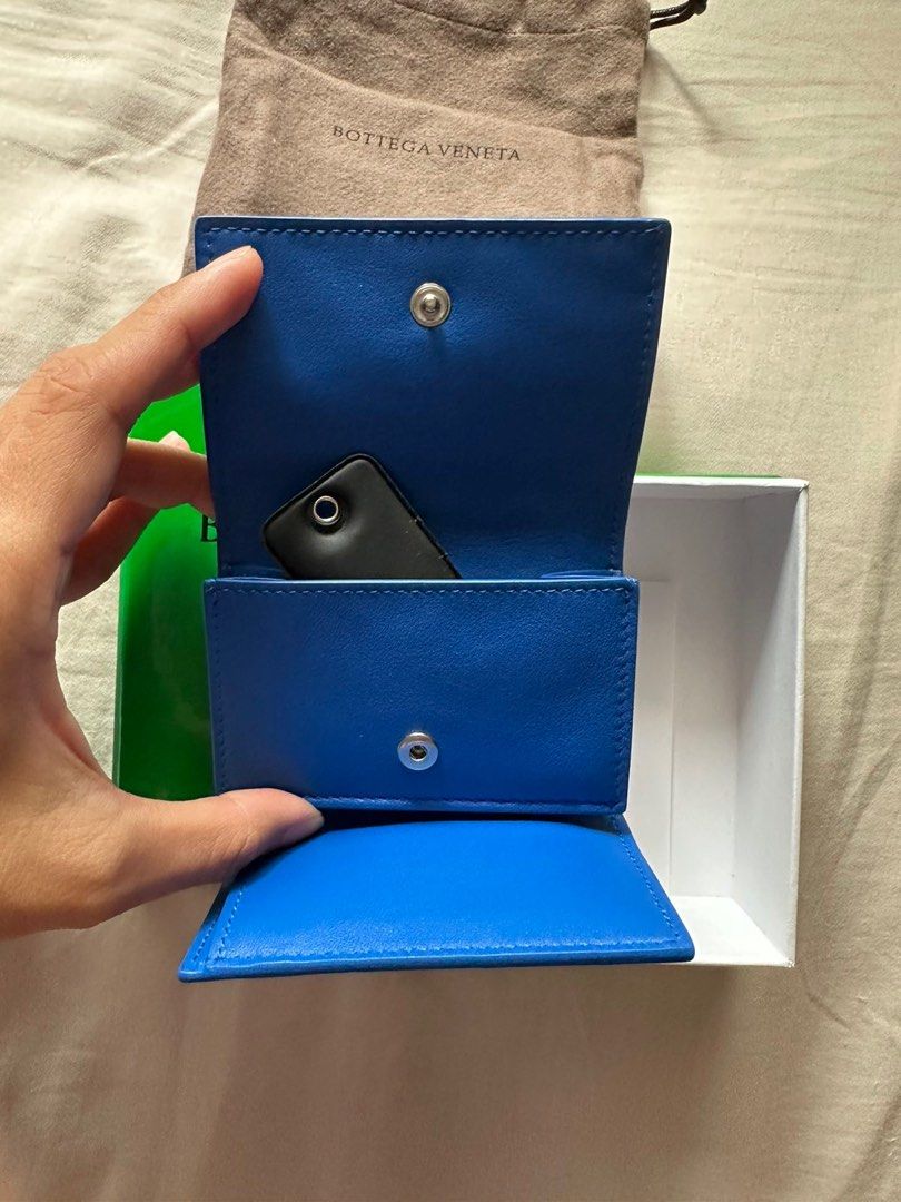 Bottega Venetta tri-fold wallet (Category: Luxury Bags & Wallets) located in Pasay City. Submitted by netuy (Listing ID 1250305990, Image 3). Description: Intercciato leather wallet. Color parakeet (royal blue). Tri-fold - bill compartment, 3 card slots, with coin purse. Bought in Italy last June 2023 only. .