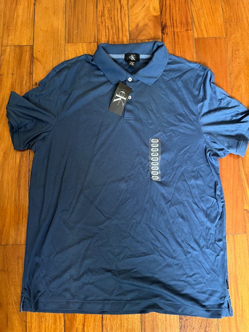 Calvin Klein Polo Shirt in Blue on Carousell