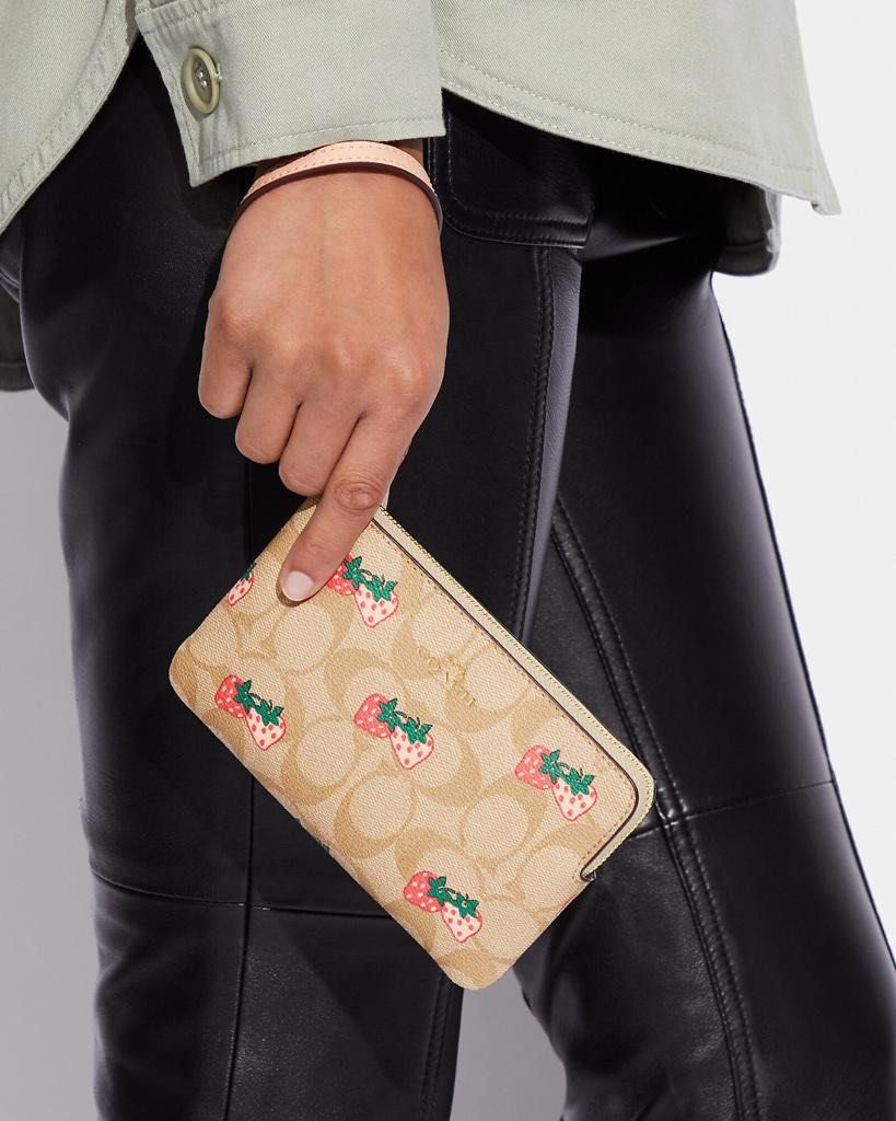 Corner zip wristlet in signature canvas with strawberry print Clearance