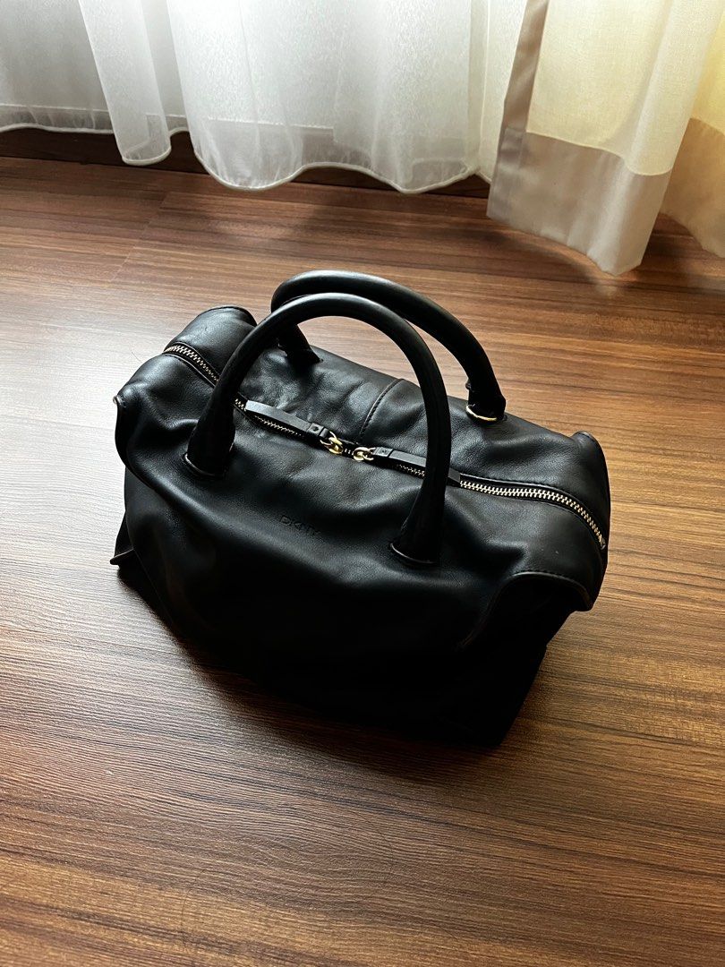 M black bowling bag