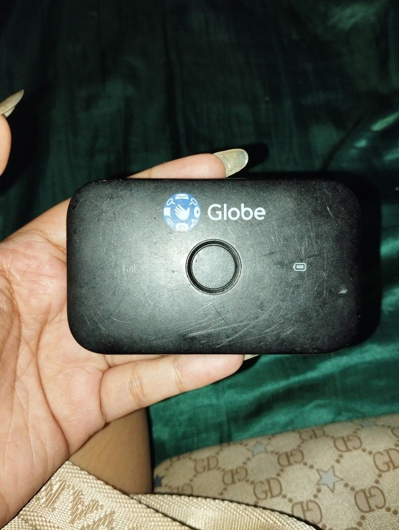 globe pocket wifi (Category: Other Accessories) located in Manila. Submitted by eyaaa (Listing ID 1250250357, Image 1). Description: no issue scratches only.