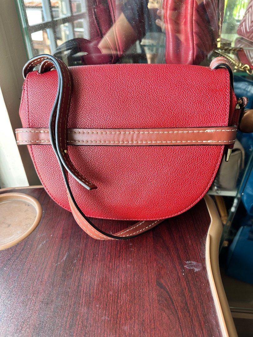 Loewe Gate Small with Entrupy (Category: Luxury Bags & Wallets) located in Quezon City. Submitted by queenieangel (Listing ID 1250196357, Image 2). Description: This small Gate Bag boasts a history that adds to its allure, showcasing its journey alongside its previous owner. With its meticulously designed saddle silhouette and signature knotted front belt, this bag captures the essence of artisanal craftsmanship and modern sophistication. As you 