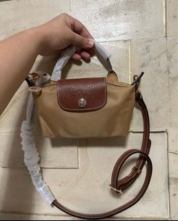 Longchamp mini slingbag tan