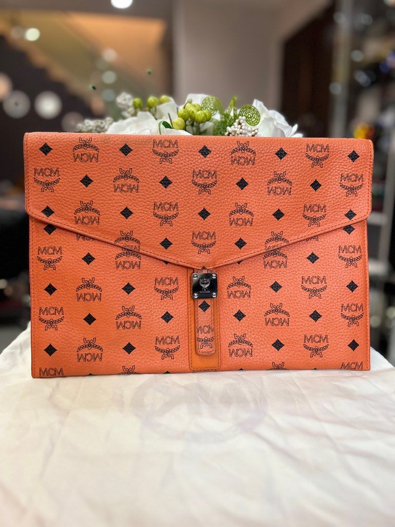 MCM ORANGE MONOGRAM LARGE CLUTCH