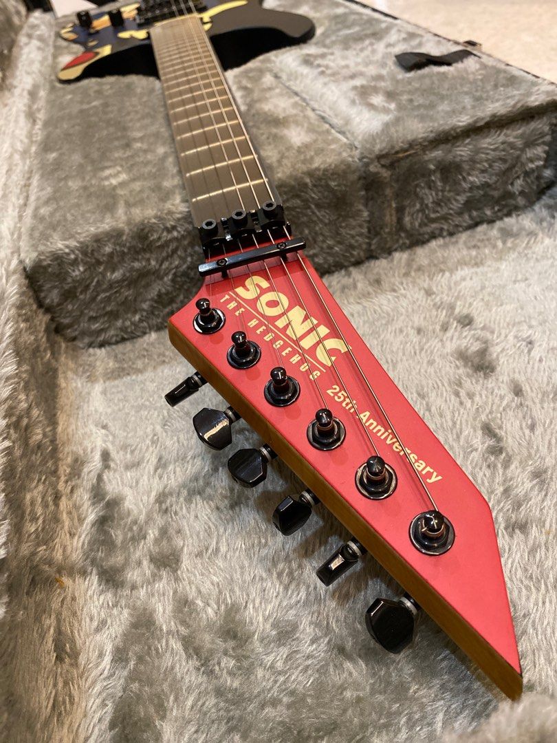SN - 25th Sonic the hedgehog guitar-II (Category: Musical Instruments) located in Singapore. Submitted by spade51 (Listing ID 1250349187, Image 3). Description: SN-25TH Sonic the hedgehog guitar-II This is the sonic 25th anniversary ESP which was released in limited quantities in 2016. Guitar is in very good condition with minor flaws(some rust on saddle screws of the floyd rose, rusty strings(which can be changed)). Comes with certificate of aut