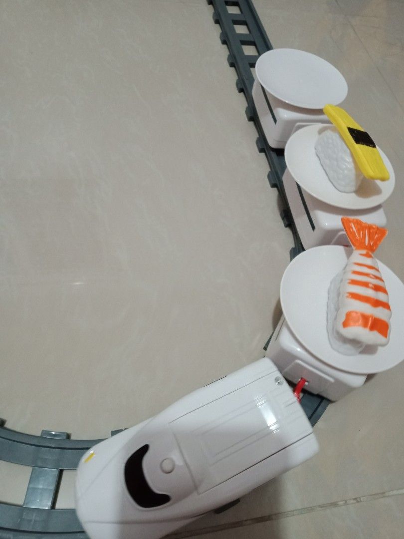 Sushi Train (Category: Food Organization & Storage) located in Quezon City. Submitted by mhoniqvela04 (Listing ID 1250190627, Image 2). Description: Conveyor Belt Sushi Train Kaitensushi Rail Description: Made of high quality ABS+Plastic material,durable,eco-friendly. Battery powered by 2pcs AA batterry(included). Specification: Material:ABS+Plastic Size:Approx.62.5x43x1.5cm/24.60x16.93x0.59in Issue: Kulang ng isang food toy, nakain na ata haha c