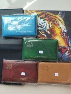 S*Wallets 1977:1979:1980:1983 uncirculated coins sets
