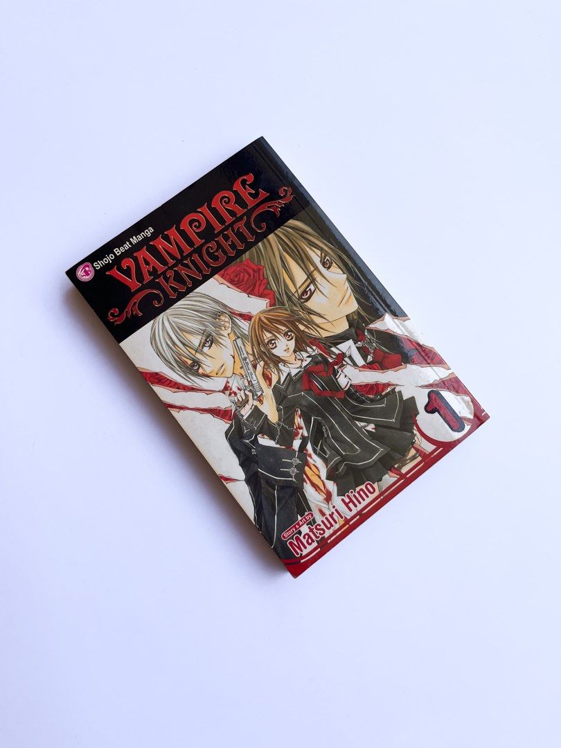 Vampire Knight Volume 1 (English) (Category: Comics & Manga) located in San Pedro. Submitted by firstblush (Listing ID 1250234326, Image 1). Description: Typical wear due to age, such as small dings to the cover etc, and the pages are yellowed but intact and clean..