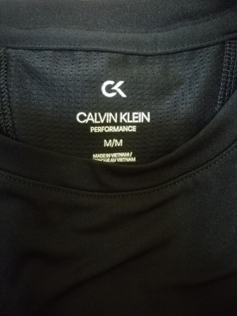 1 set Calvin Klein Performance Tshirt and Leggings, Women's Fashion, Tops,  Shirts on Carousell