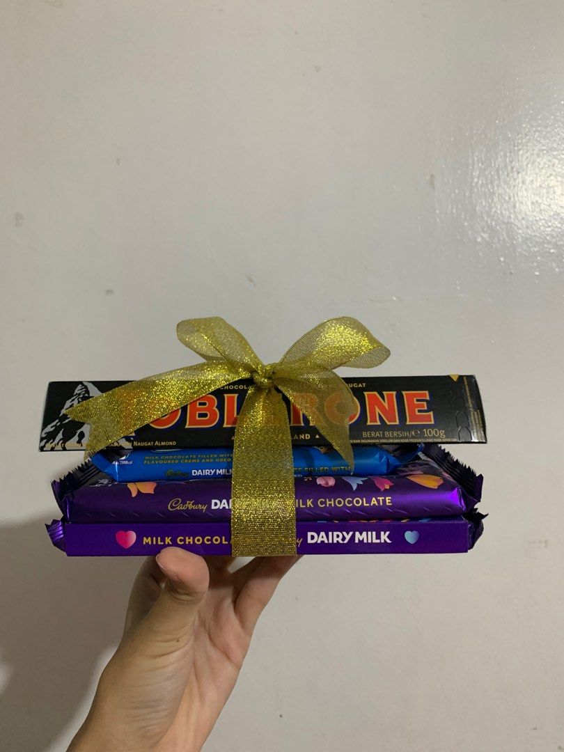 Chocolate Gift Bundle (Cadbury and Toblerone) (Category: Gift Baskets & Hampers) located in Las Pinas. Submitted by samlordgrace (Listing ID 1250519528, Image 2). Description: Chocolate bundle for birthday, anniversary, and other occasions Note: Customizable depending on availability .