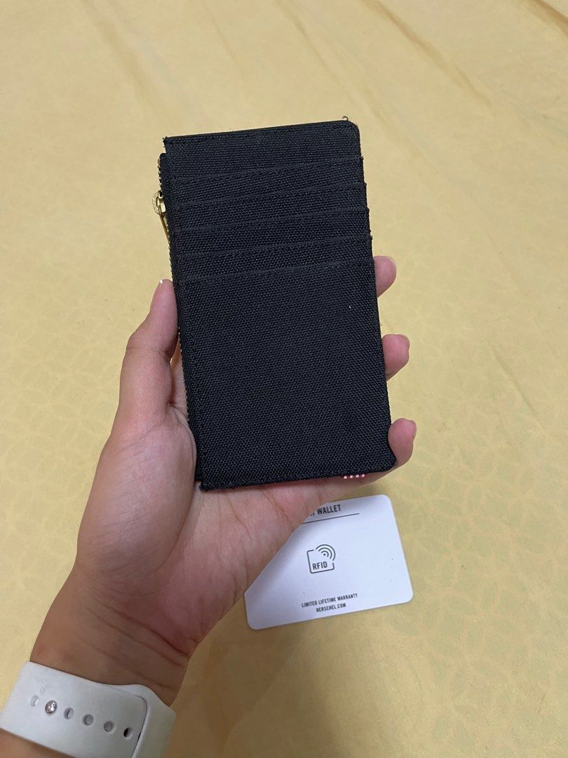 Herschel Oscar Card Holder Wallet (Category: Wallets & Card holders) located in Taytay. Submitted by nadsandthings (Listing ID 1250431172, Image 2). Description: Herschel Oscar Li RFID Wallet (Black) Super great condition! Bought in UPTC Herschel RFS: Have too much wallets na.