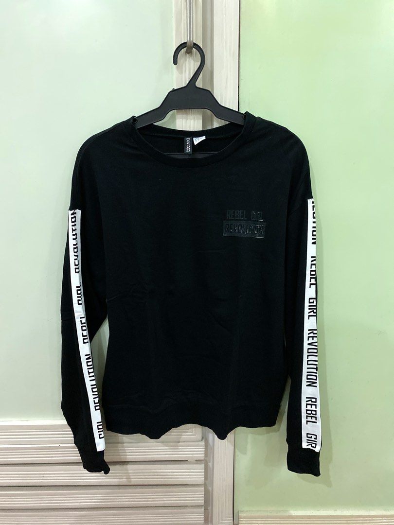 H M Black Sweater Rebel Girl Revolution Women s Fashion Coats Jackets and Outerwear on Carousell