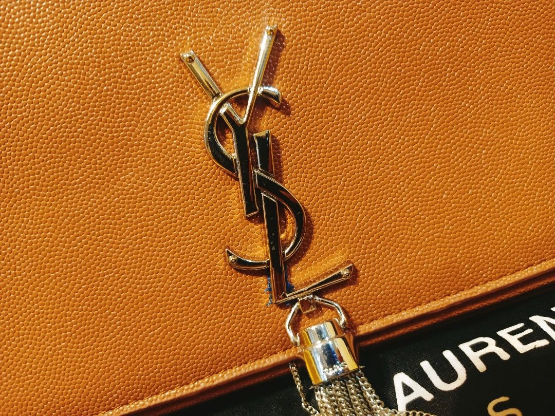 Japan Preloved YSL sling bag (Category: Luxury Bags & Wallets) located in Cebu City. Submitted by day.98 (Listing ID 1250505860, Image 3). Description: selected from japan surplus genuine leather coded & etikita with dust bag no flaws.