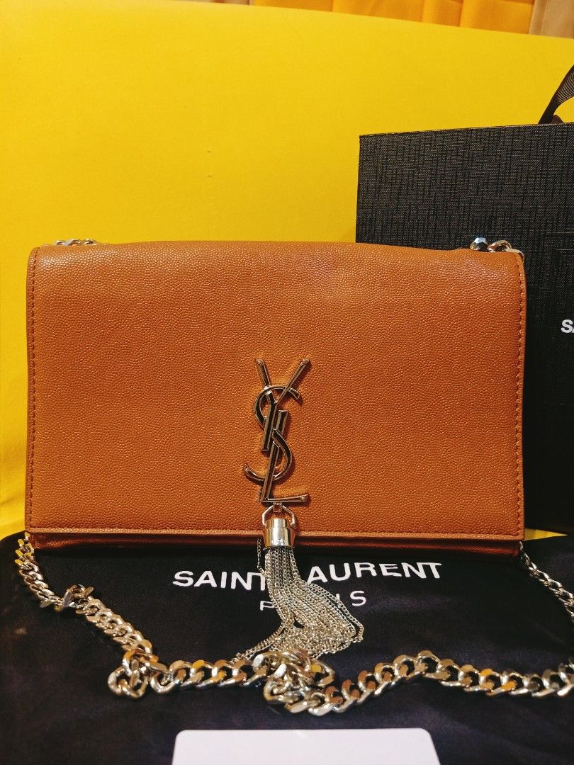 Japan Preloved YSL sling bag (Category: Luxury Bags & Wallets) located in Cebu City. Submitted by day.98 (Listing ID 1250505860, Image 2). Description: selected from japan surplus genuine leather coded & etikita with dust bag no flaws.