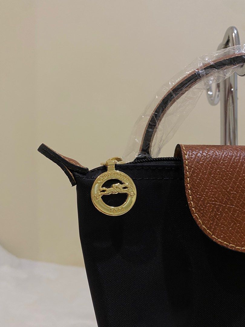 Longchamp Le Pliage Petit Mini Pouch Bag Black Signature , Women's Fashion,  Bags & Wallets, Purses & Pouches on Carousell