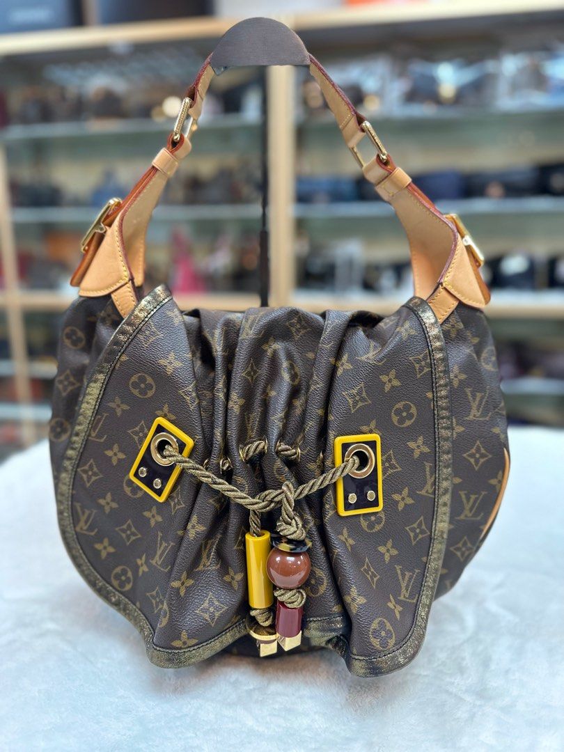 The Louis Vuitton Kalahari bag. Just gorgeous.