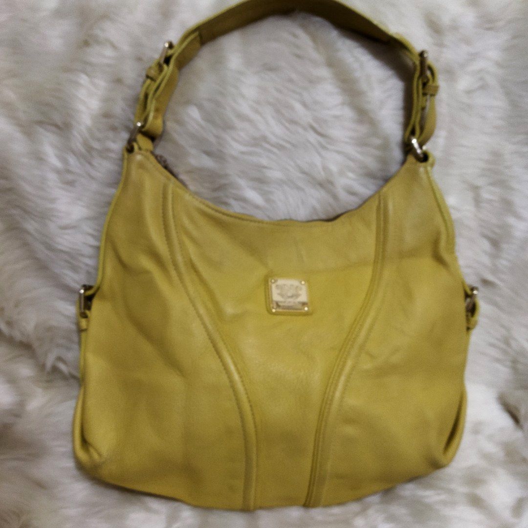 Nicole Miller Hobo Bag (Category: Shoulder Bags) located in Manila. Submitted by shopaholic_gurl (Listing ID 1113841734, Image 3). Description: excellent condition very soft leather gold hardwares sold as is.