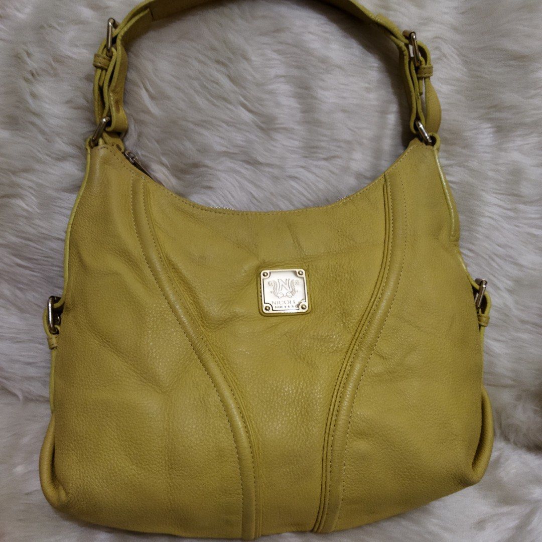 Nicole Miller Hobo Bag (Category: Shoulder Bags) located in Manila. Submitted by shopaholic_gurl (Listing ID 1113841734, Image 1). Description: excellent condition very soft leather gold hardwares sold as is.