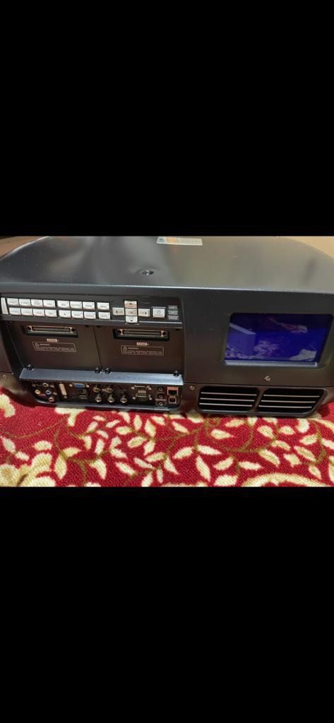 Projector (Category: Projectors) located in Singapore. Submitted by scarlet_1610 (Listing ID 1250413402, Image 3). Description: $250 price negotiable. Still in good condition .