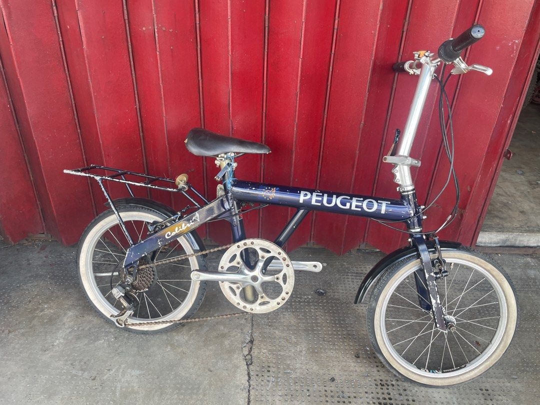 Vintage peugeot best sale folding bike