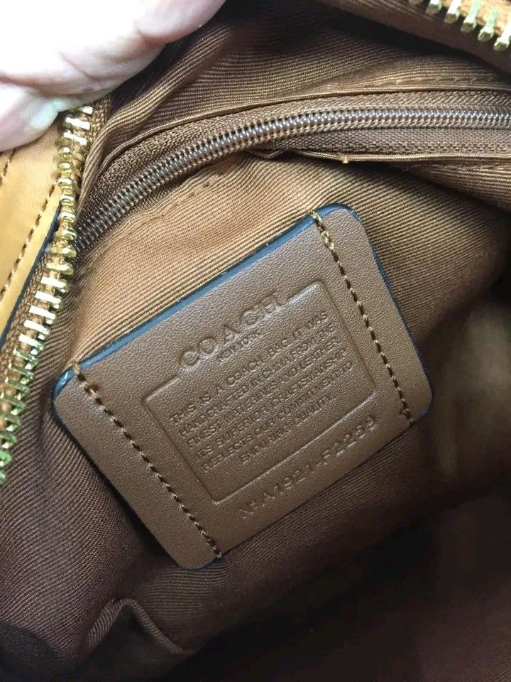 Coach bag on sale ykk zipper