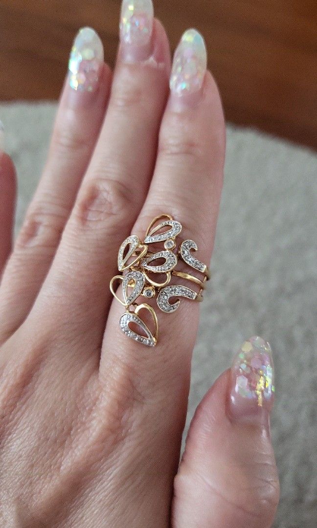 Heart ring with diamond in the middle hotsell