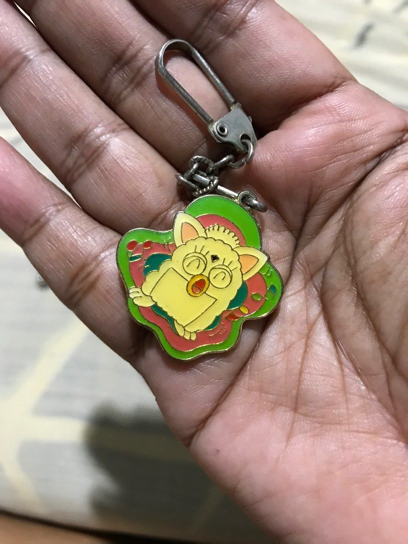 1999 tomy furby keychain (Category: Character Goods) located in Muntinlupa City. Submitted by joanofarc1013 (Listing ID 1250594081, Image 2). Description: 150 Each rare na po ito maganda yun lock nang chain nya in like new condition with shoppe checkout .