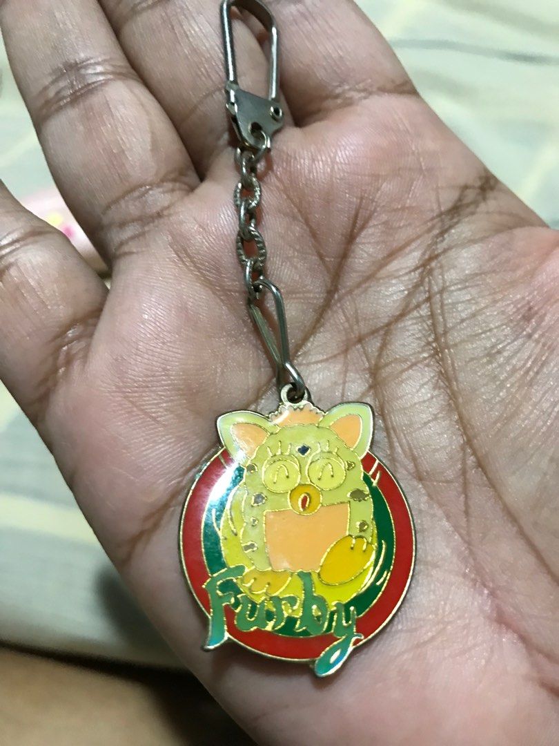 1999 tomy furby keychain (Category: Character Goods) located in Muntinlupa City. Submitted by joanofarc1013 (Listing ID 1250594081, Image 3). Description: 150 Each rare na po ito maganda yun lock nang chain nya in like new condition with shoppe checkout .