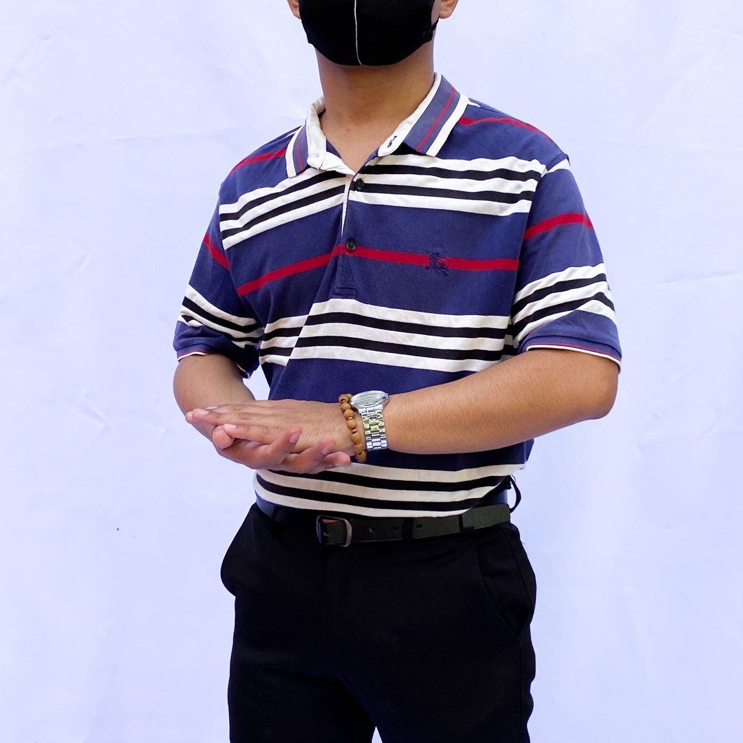 Authentic Burberry Striped Polo Shirt (Category: Tshirts & Polo Shirts ) located in Iloilo. Submitted by sasukejd (Listing ID 1250724175, Image 2). Description: Large for men, Semi-XL for women Dimensions: 28x21 Embroidered logo Slight fade on collar.