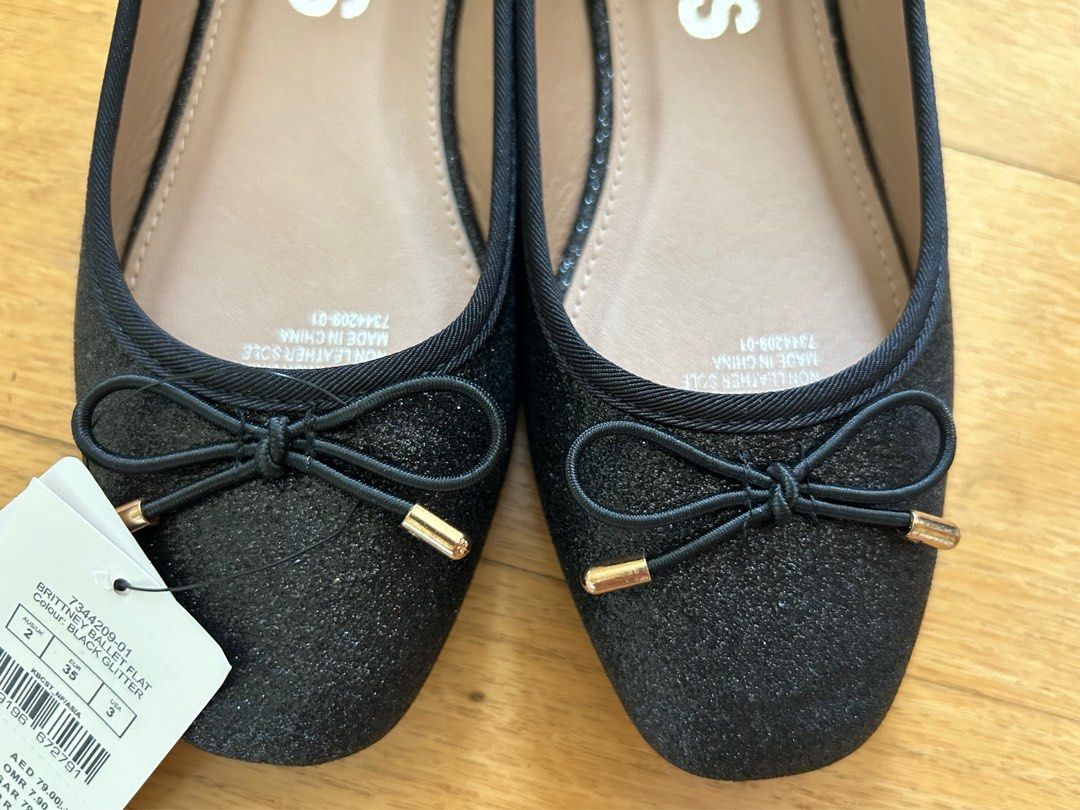 Kids on sale black flats