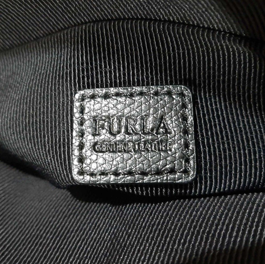 Furla Mini Alma Type Sling Bag (Category: Luxury Bags & Wallets) located in Taguig. Submitted by esa.agustin (Listing ID 1250700651, Image 3). Description: Original Furla mini black leather sling bag. With dust bag..