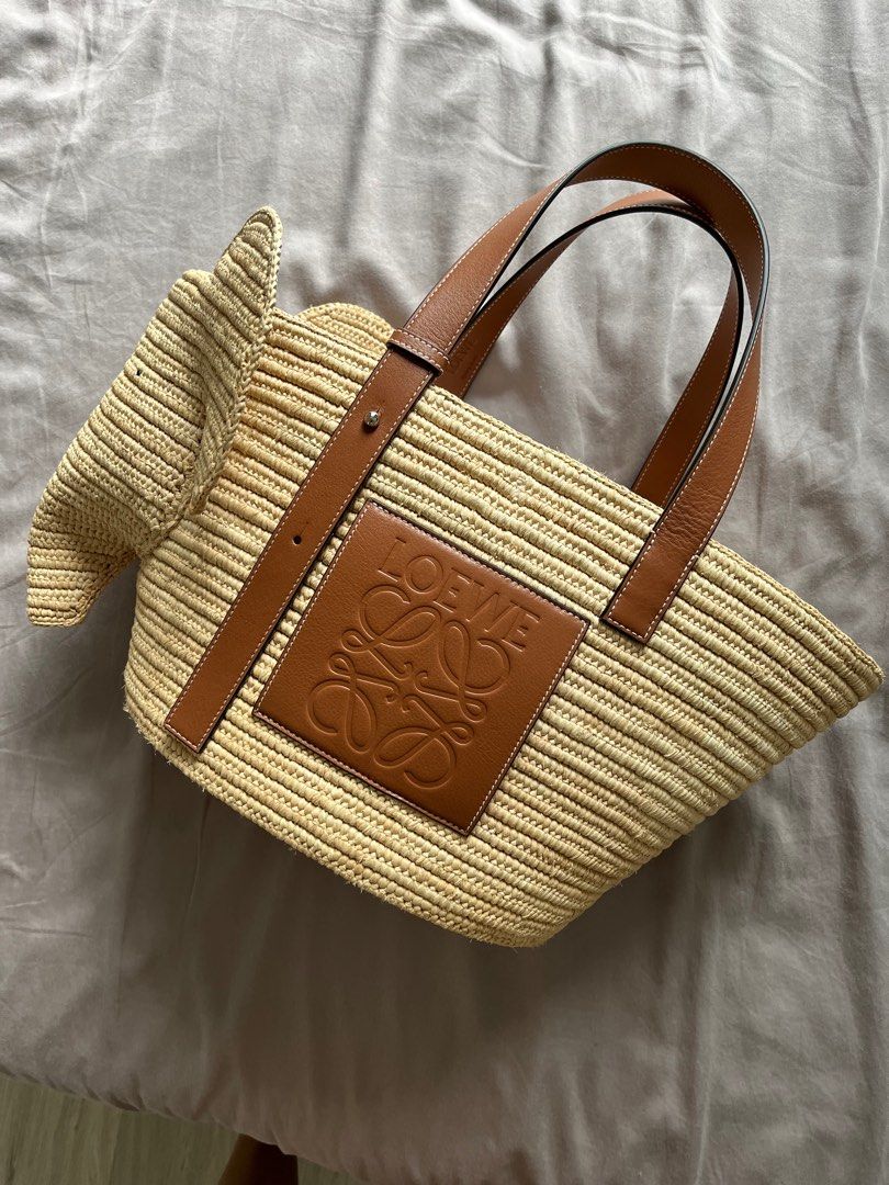 Shop LOEWE Elephant basket bag in raffia and calfskin (A546T21X01