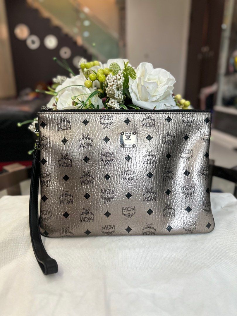 MCM LOGO CLUTCH ZIPPER POUCH Men s Fashion Bags Belt bags