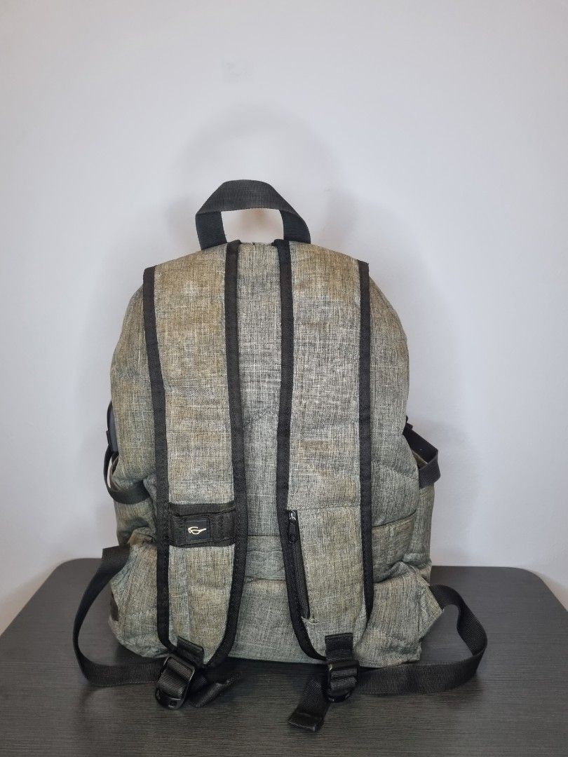 Multi Function Travel Backpack (Category: Backpacks) located in Bayan Lepas. Submitted by sherylgs (Listing ID 1250633888, Image 2). Description: Used this to carry my laptop and for travelling. It has a card compartment on the left strap, which is convenient to keep cards for easy access. It also has a passthrough function for earphones and power bank. Reason to sell: Bought a new laptop which was too big to fit in this bag..