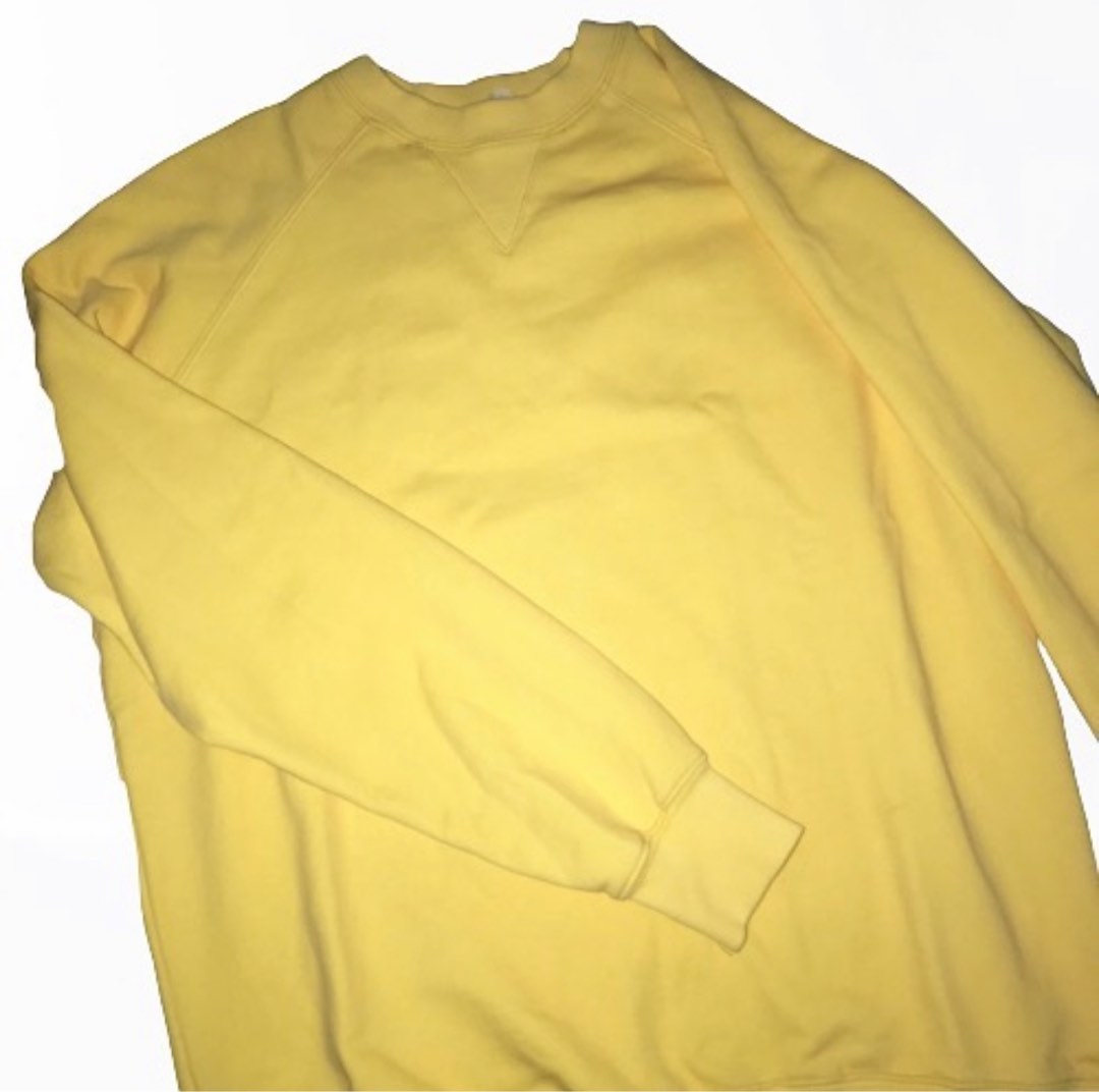 Pastel hotsell yellow sweatshirt
