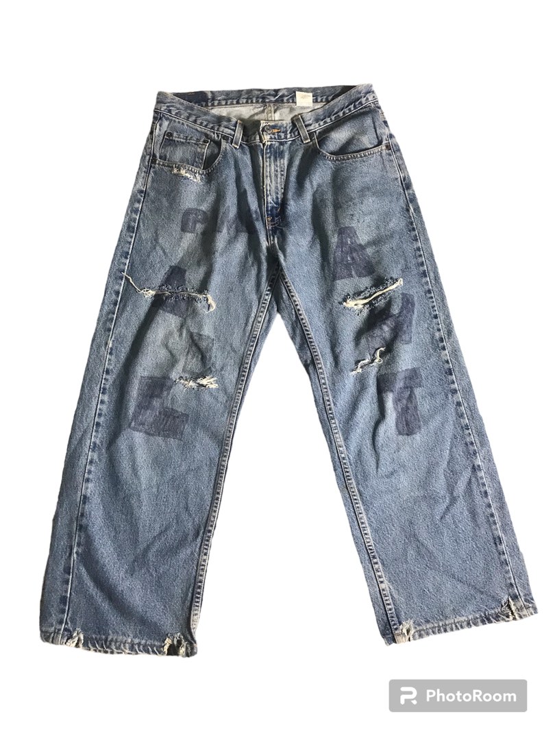 Levis 569 ripped online jeans