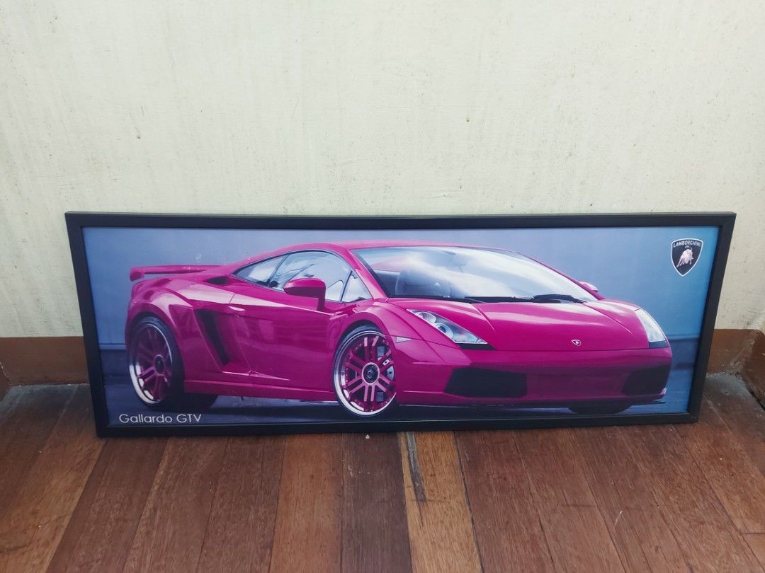Sports Car Framed Poster (Category: Frames & Pictures) located in Makati City. Submitted by berniebones (Listing ID 1250730655, Image 1). Description: Sports Car Framed Poster -Wall hanging. -Featured car: Lamborghini Gallardo GTV. -Dimensions: approx. 35.5(L)x12.8in(W). Perfect for room decor or commercial spaces. Issues: Minor tear on the brown back cover on the upper middle part (see last photo). Some discoloration on the car color. RFS: Declu