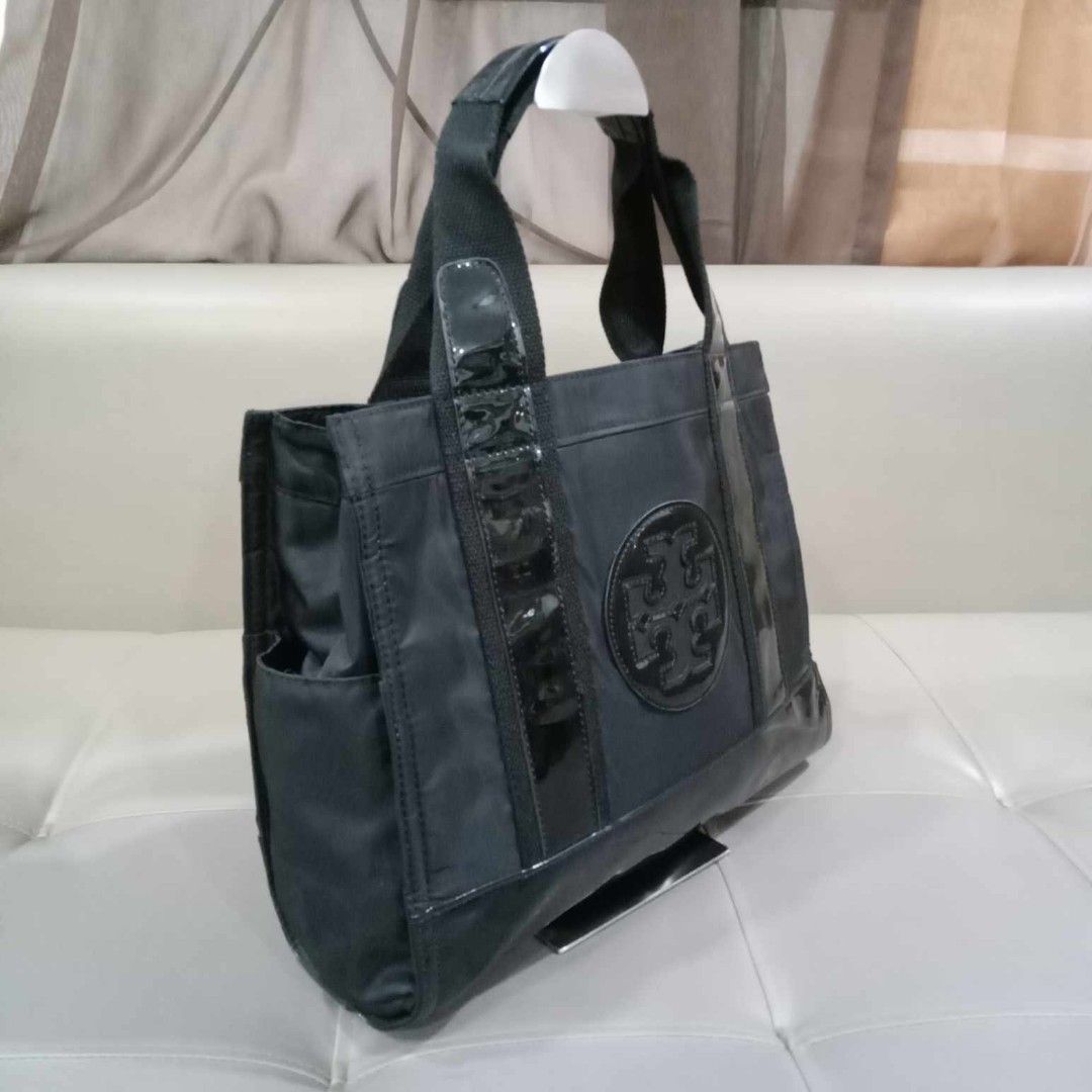 Tory Burch Ella Black Small Tote (Category: Luxury Bags & Wallets) located in Taguig. Submitted by esa.agustin (Listing ID 1250705261, Image 2). Description: Original Tory Burch Ella black nylon small tote bag. With dust bag..
