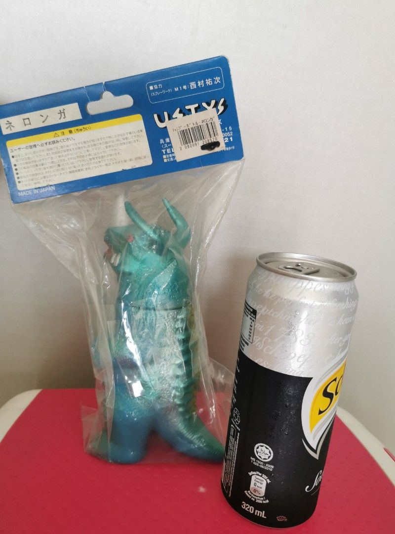 MISB Ustoys Neronga 2002 Sofubi us toys Tsuburaya ultraman kaiju (Category: Toy Figures) located in Singapore. Submitted by sofubi168 (Listing ID 1250632368, Image 2). Description: Never opened. Last 3 photos taken from Internet. Rare MISB piece From their 2002 Shampoo series, this Ultra kaiju legend is a blue vinyl with metallic green-blue and yellow accents! Comes with original bag and header!.